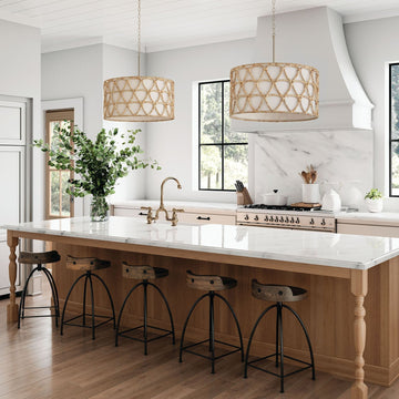 Modern kitchen with ceiling lights creating soft ambient light, featuring flush mount ceiling light, pendant lighting, and chandelier light | Ocean Pacific Lighting