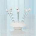 GLOBAL VIEWS S/8 ALABASTER COCKTAIL PICKS W/BASE - Decorative Accents