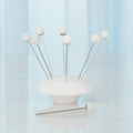 GLOBAL VIEWS S/8 ALABASTER COCKTAIL PICKS W/BASE - Decorative Accents