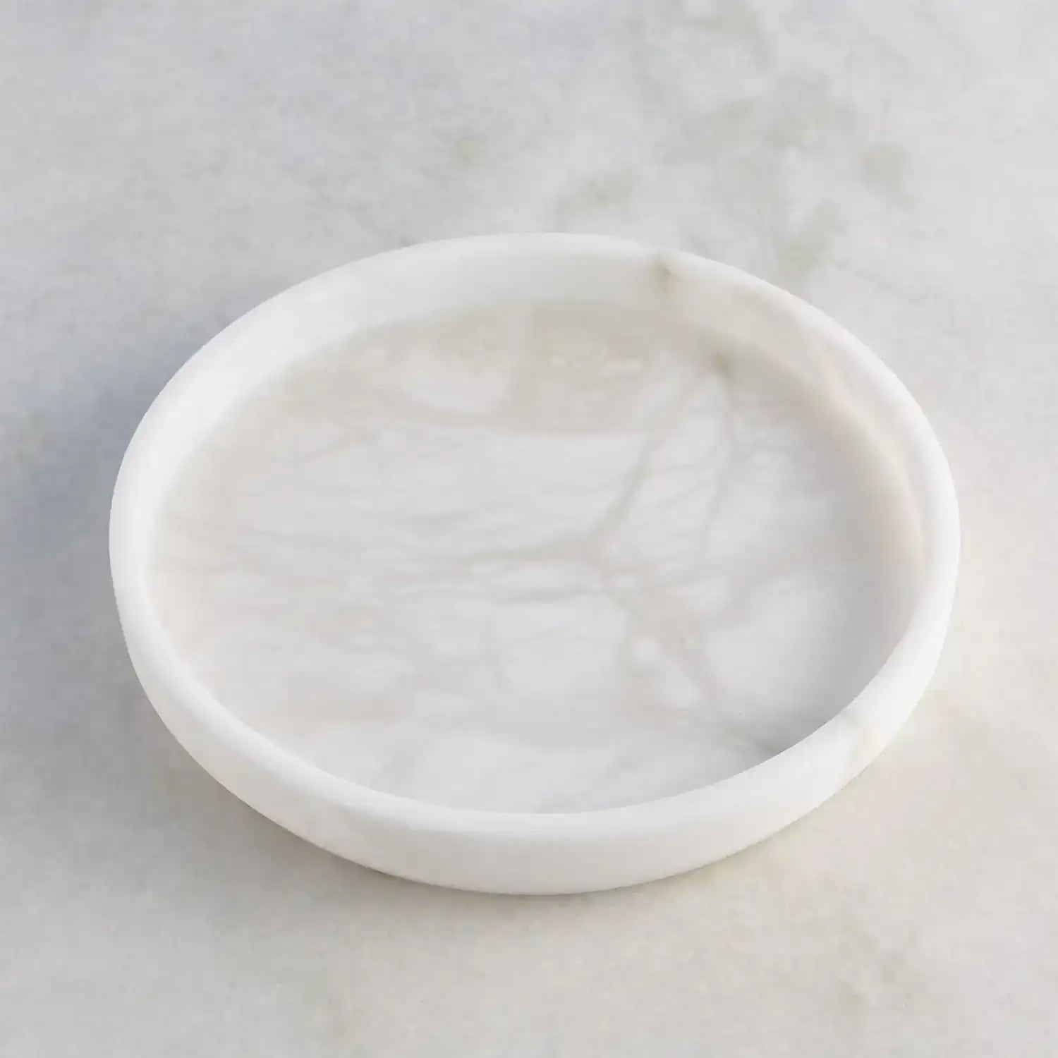 GLOBAL VIEWS ALABASTER TAPERED ROUND TRAY - Decorative Accents