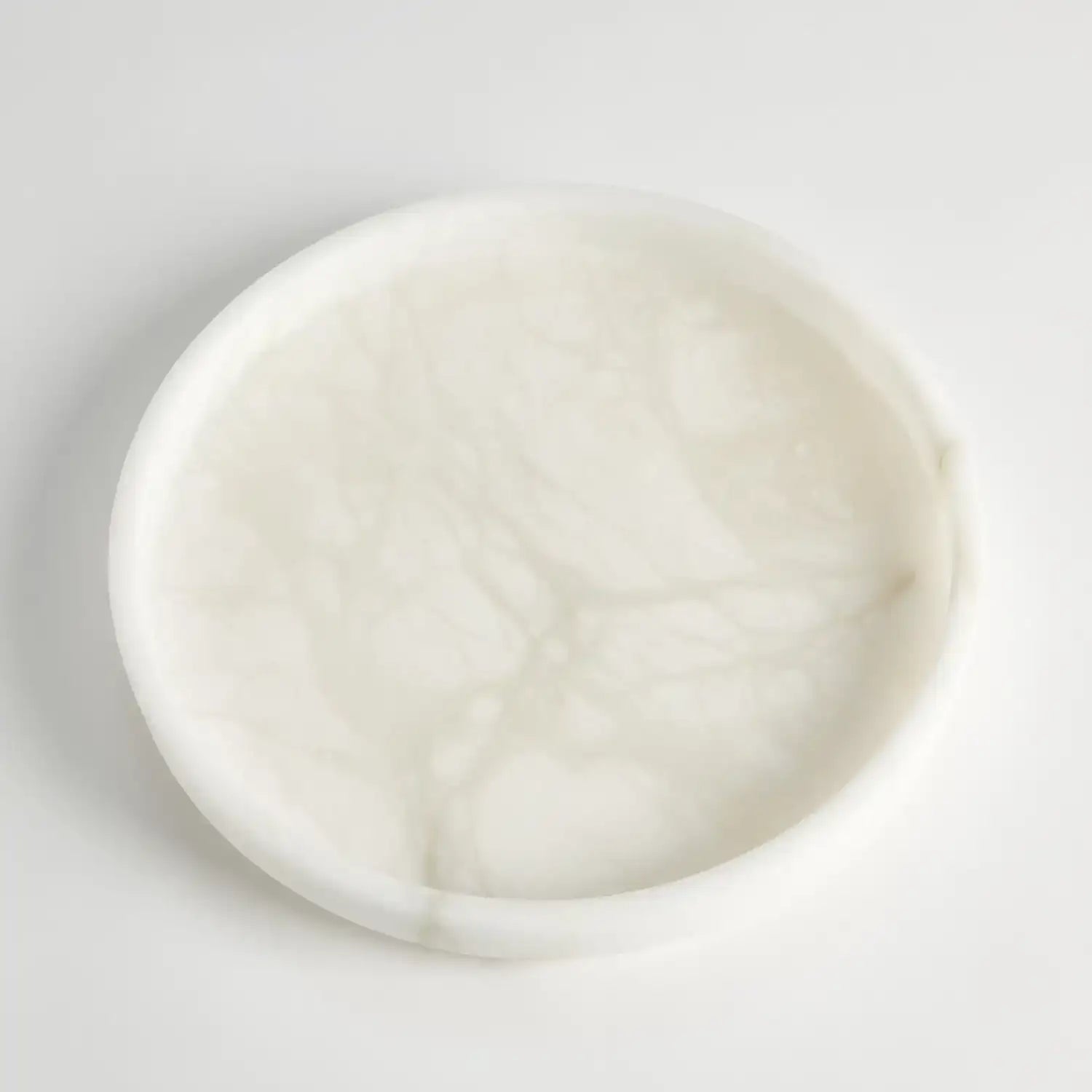 GLOBAL VIEWS ALABASTER TAPERED ROUND TRAY - Decorative Accents