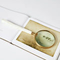 GLOBAL VIEWS CHISELED BONE MAGNIFYING GLASS - Decorative Accents