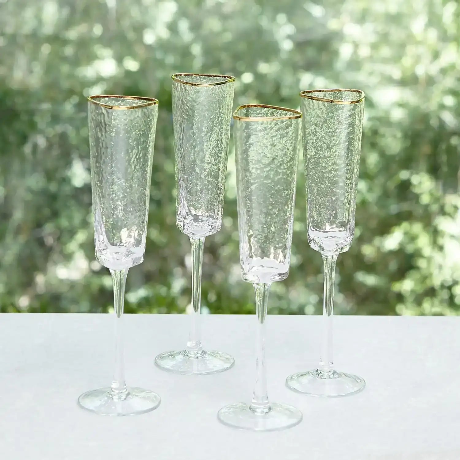 GLOBAL VIEWS S/4 HAMMERED CHAMPAGNE GLASSES - Decorative Accents