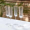 GLOBAL VIEWS S/4 HAMMERED CHAMPAGNE GLASSES - Decorative Accents