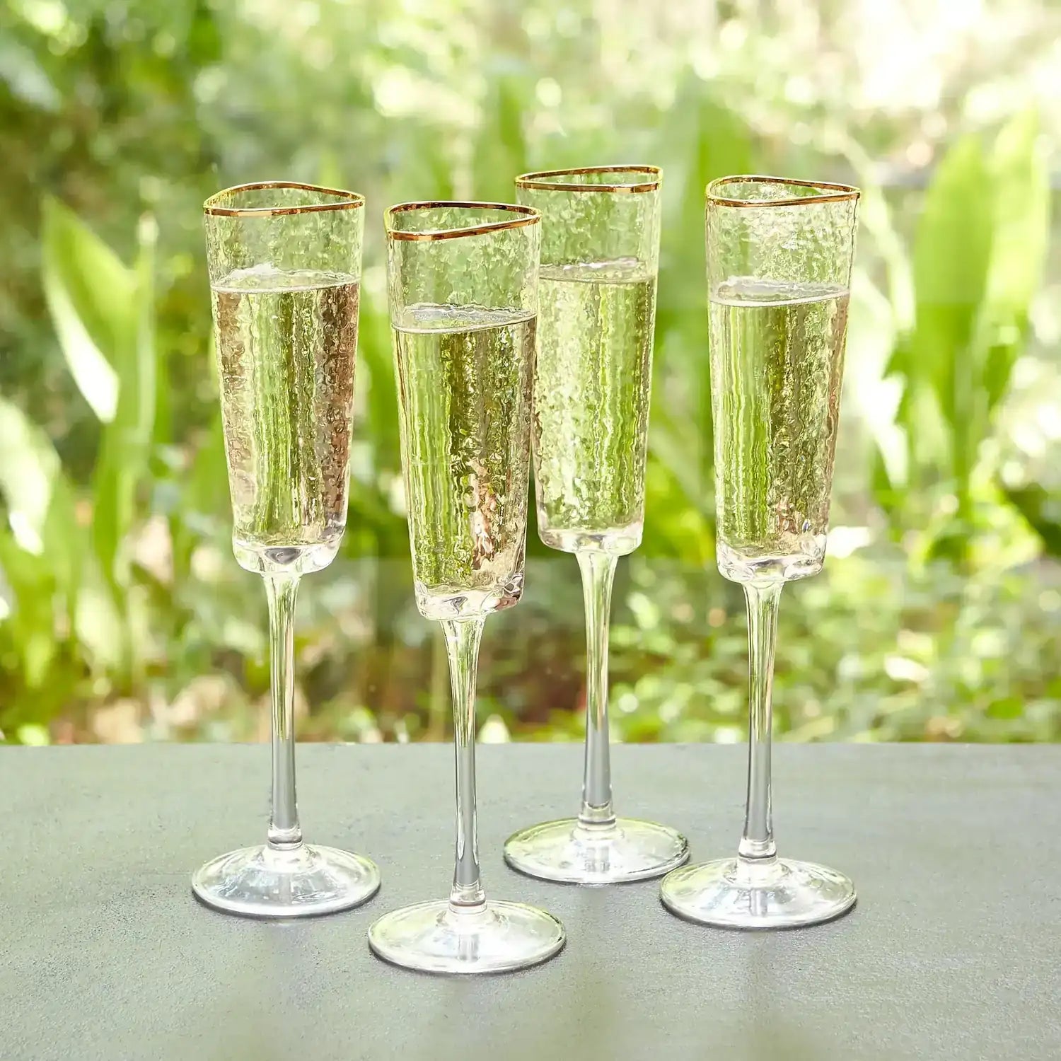 GLOBAL VIEWS S/4 HAMMERED CHAMPAGNE GLASSES - Decorative Accents