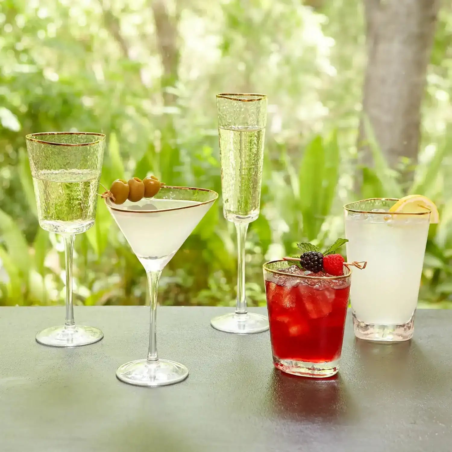 GLOBAL VIEWS S/4 HAMMERED CHAMPAGNE GLASSES - Decorative Accents