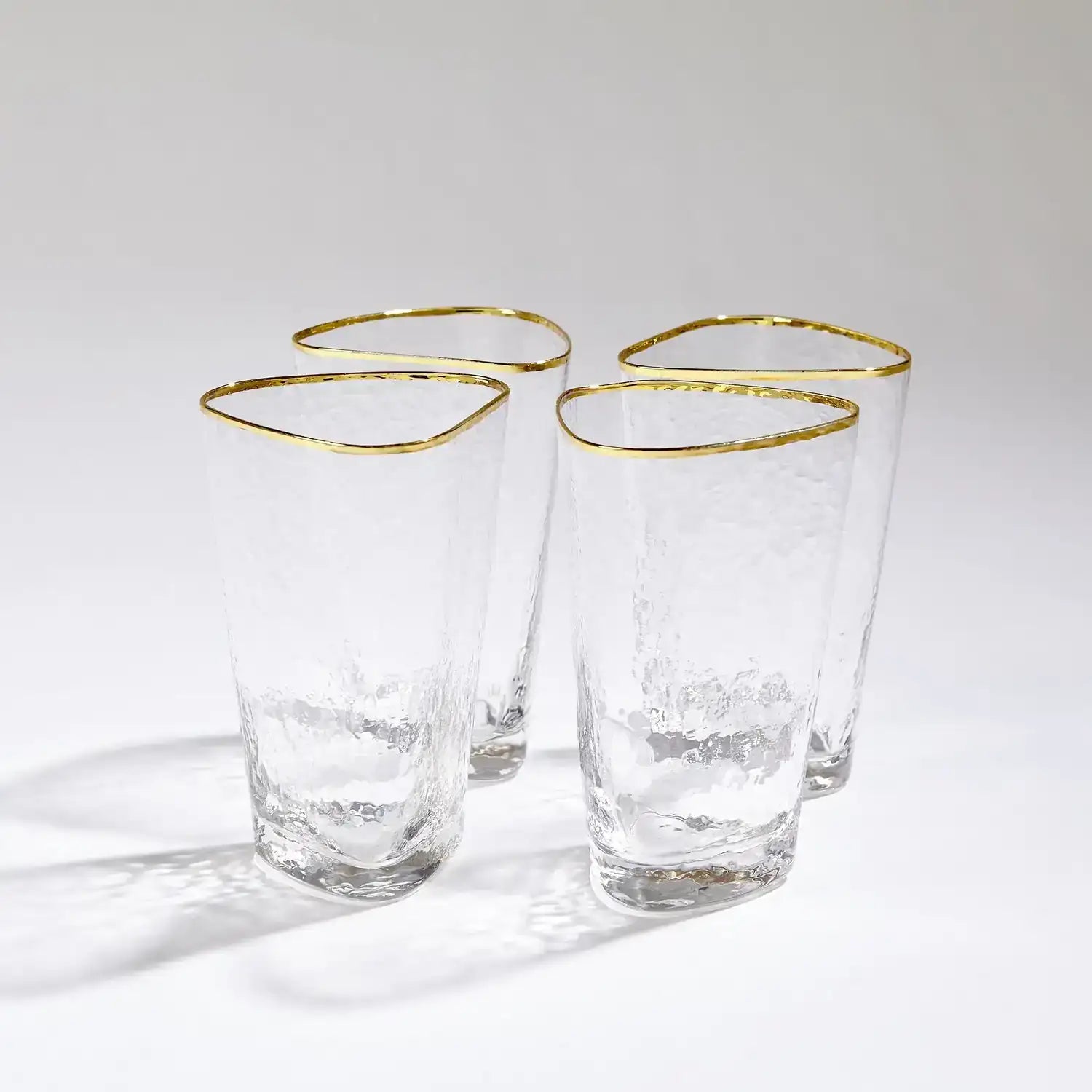 GLOBAL VIEWS S/4 HAMMERED HIGH BALL GLASSES - Decorative Accents
