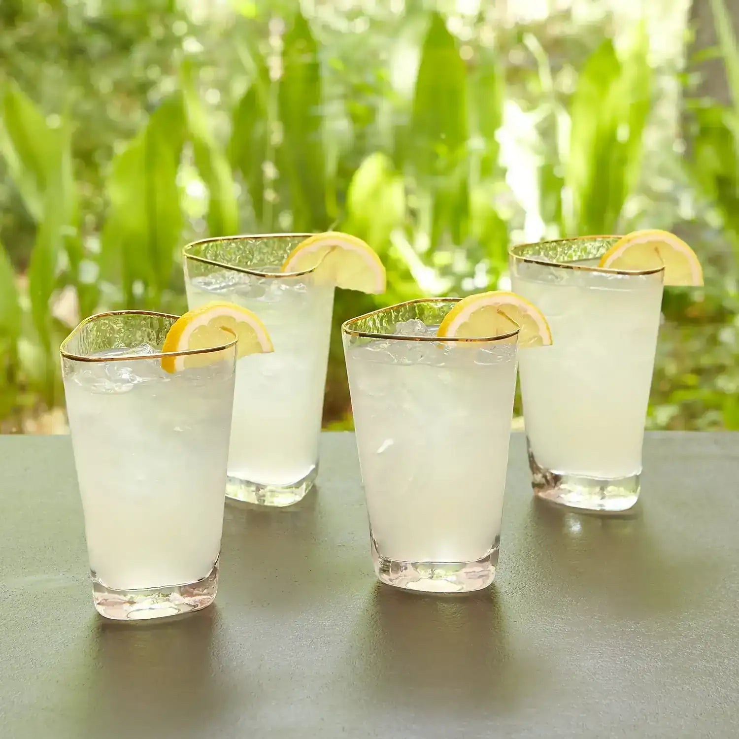 GLOBAL VIEWS S/4 HAMMERED HIGH BALL GLASSES - Decorative Accents