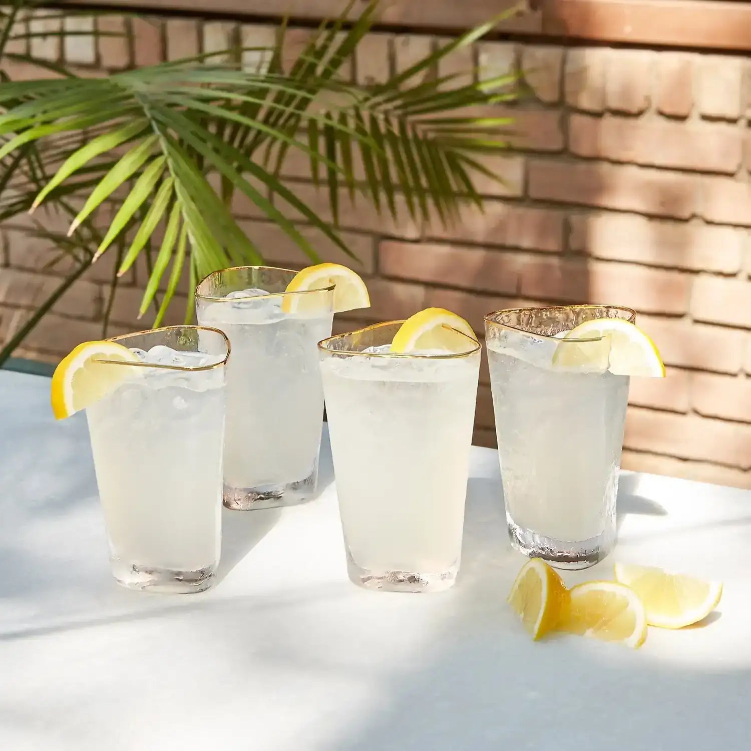 GLOBAL VIEWS S/4 HAMMERED HIGH BALL GLASSES - Decorative Accents
