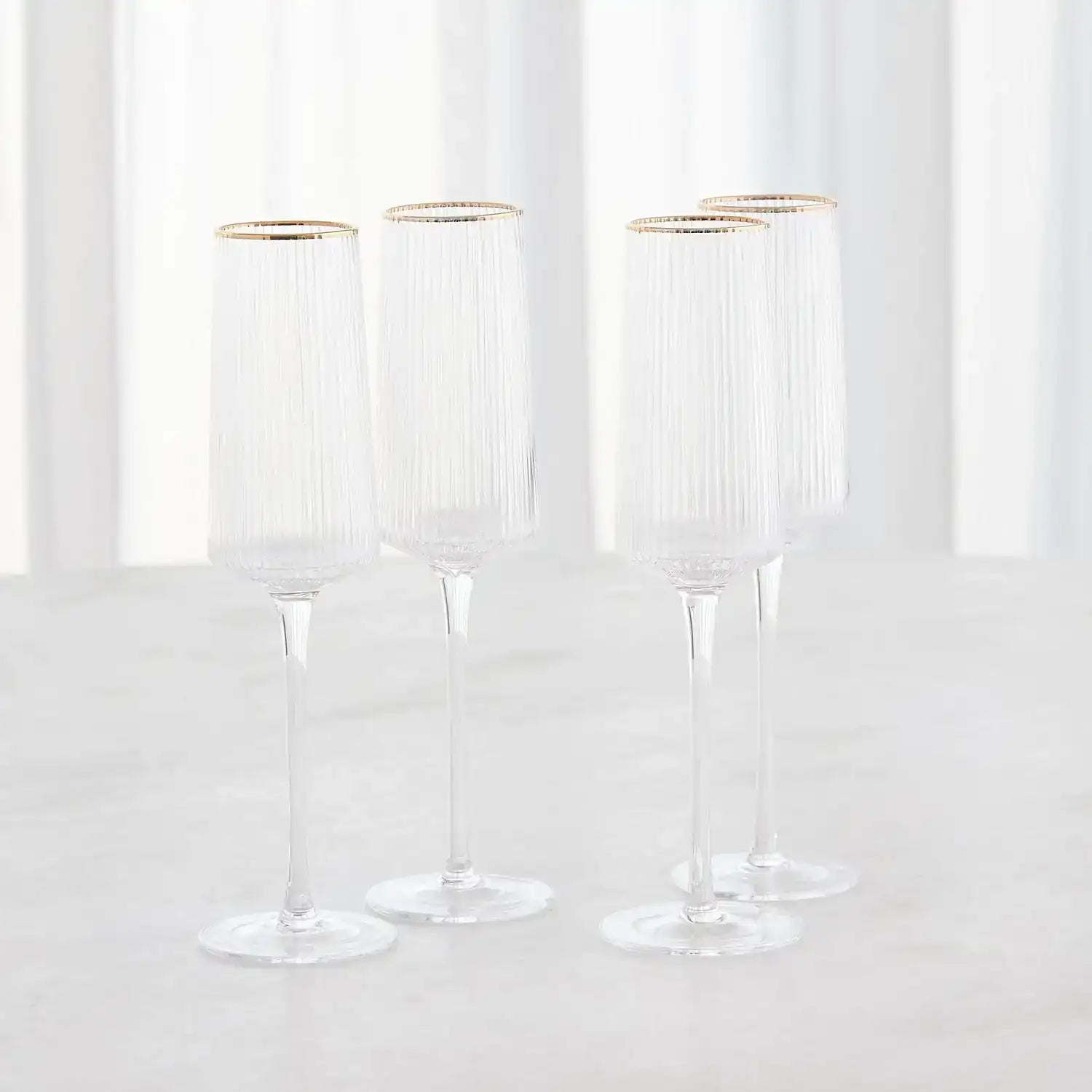 GLOBAL VIEWS S/4 WINSTON CHAMPAGNE GLASSES - Decorative Accents