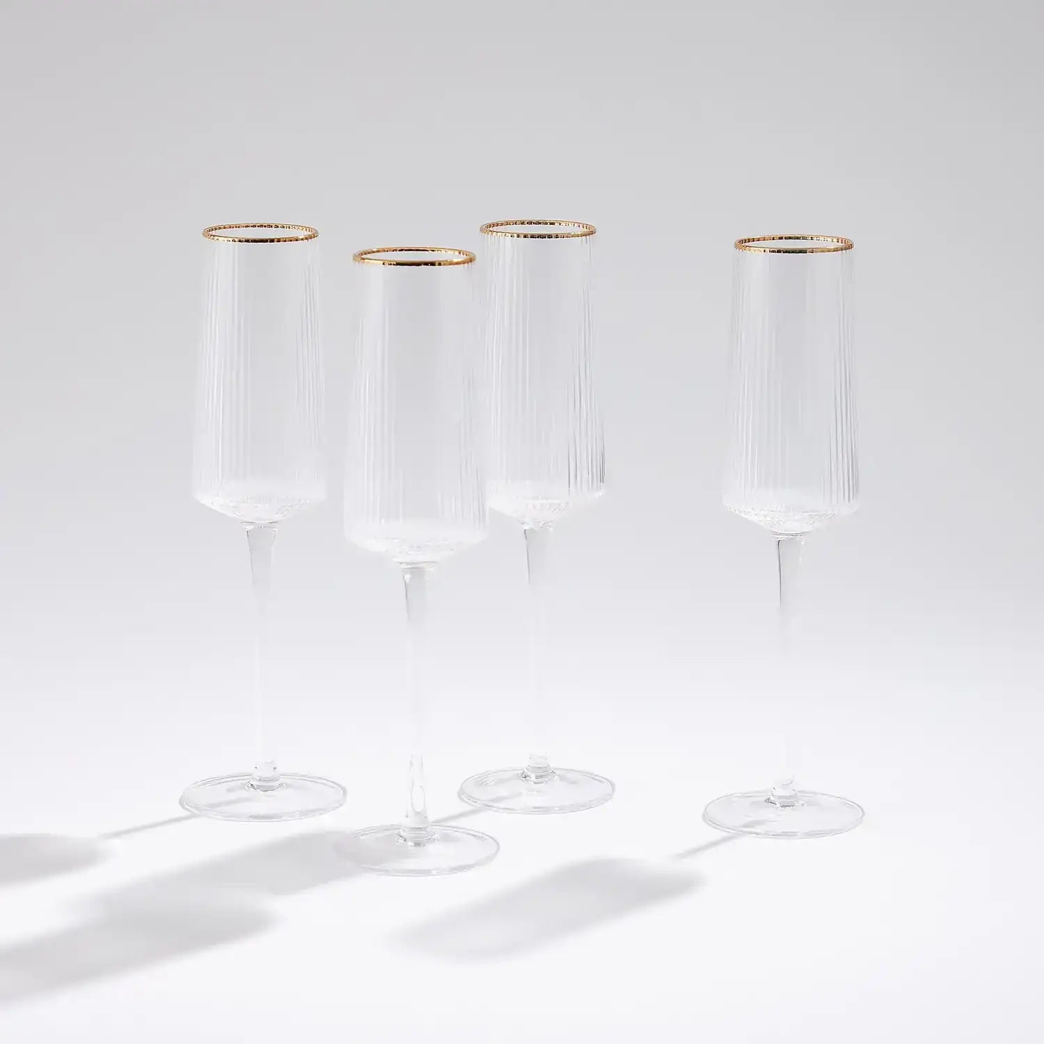 GLOBAL VIEWS S/4 WINSTON CHAMPAGNE GLASSES - Decorative Accents